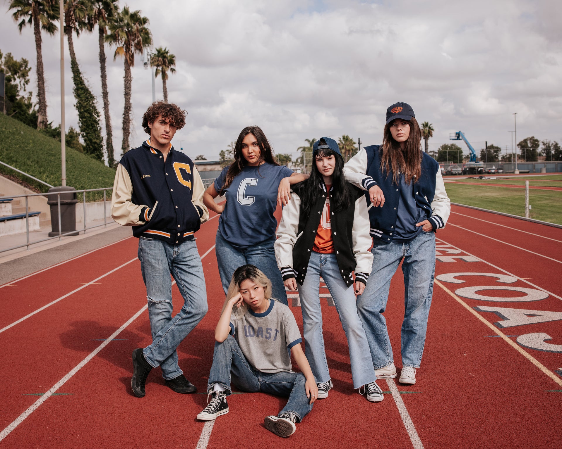 Group of people on running track